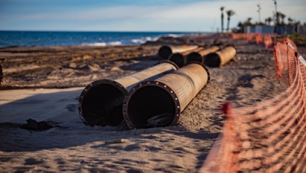La platja del Prat rebrà 100.000 m³ de sorra per recuperar l’amplada en els trams més afectats pels temporals